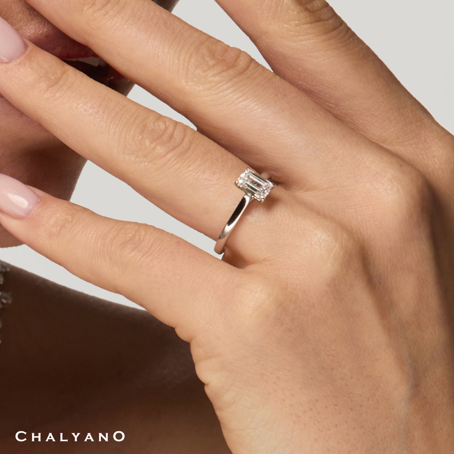 Emerald Solitaire Engagement Ring side view by Chalyano