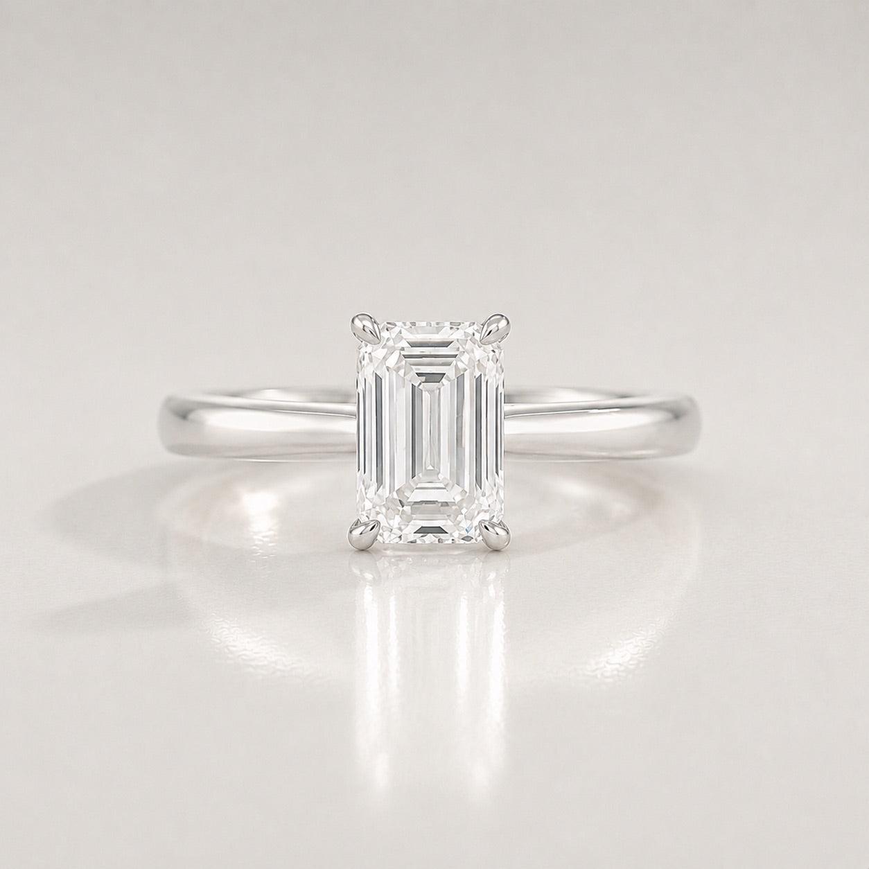 Emerald Solitaire Engagement Ring by Chalyano