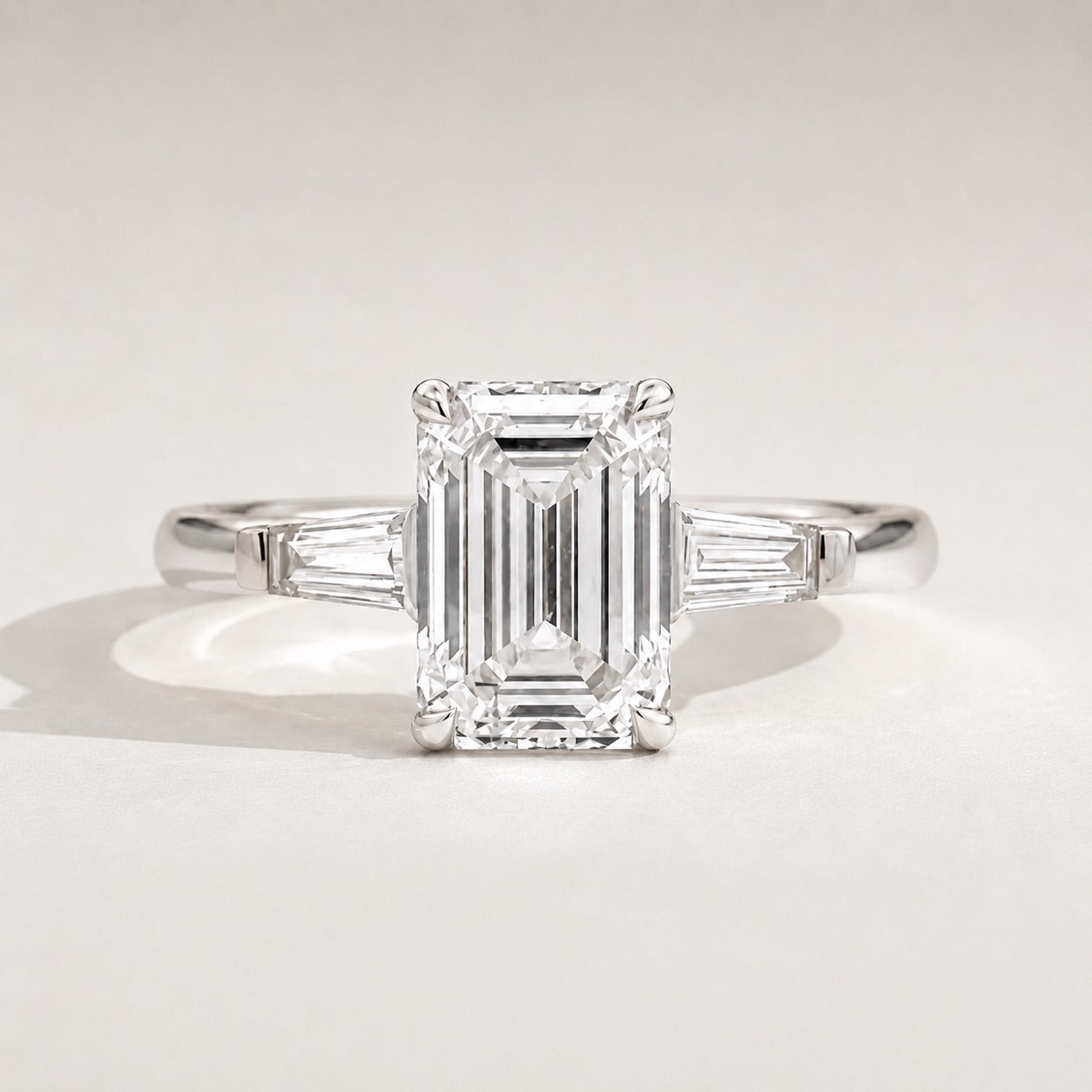 Emerald Trilogy Three Stone Engagement Ring by Chalyano