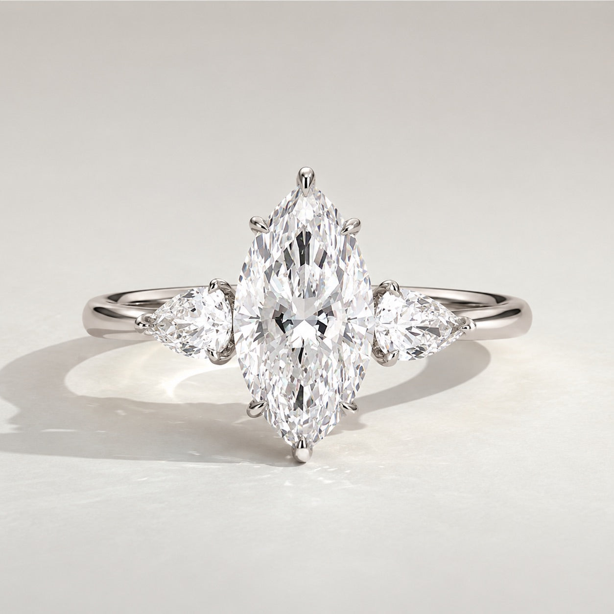 Marquise Trilogy Three Stone Engagement Ring by Chalyano