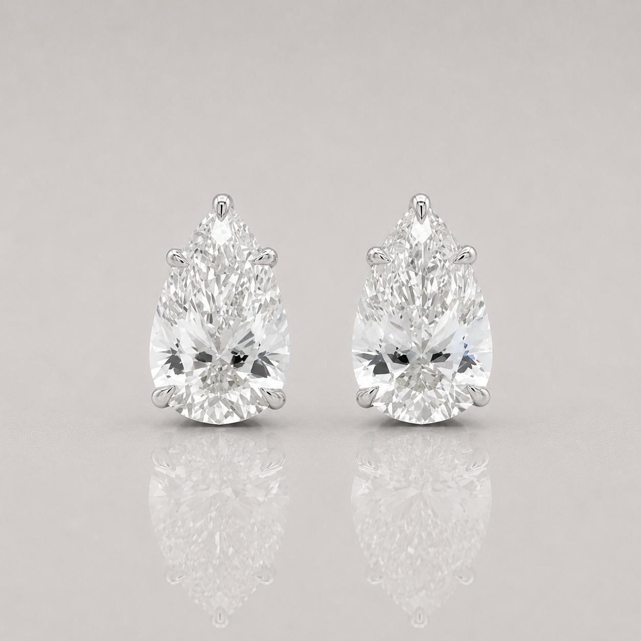 Pear Diamond Stud Earrings by Chalyano