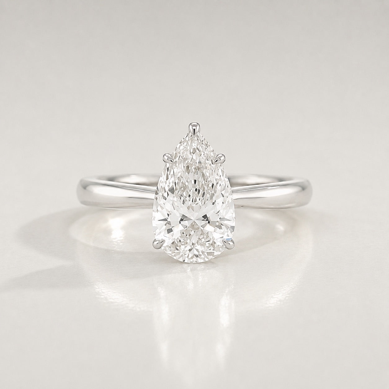 Pear Solitaire Engagement Ring by Chalyano