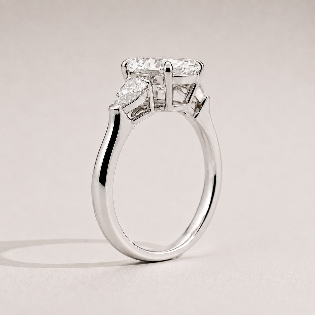 Pear Trilogy Three Stone Engagement Ring side view