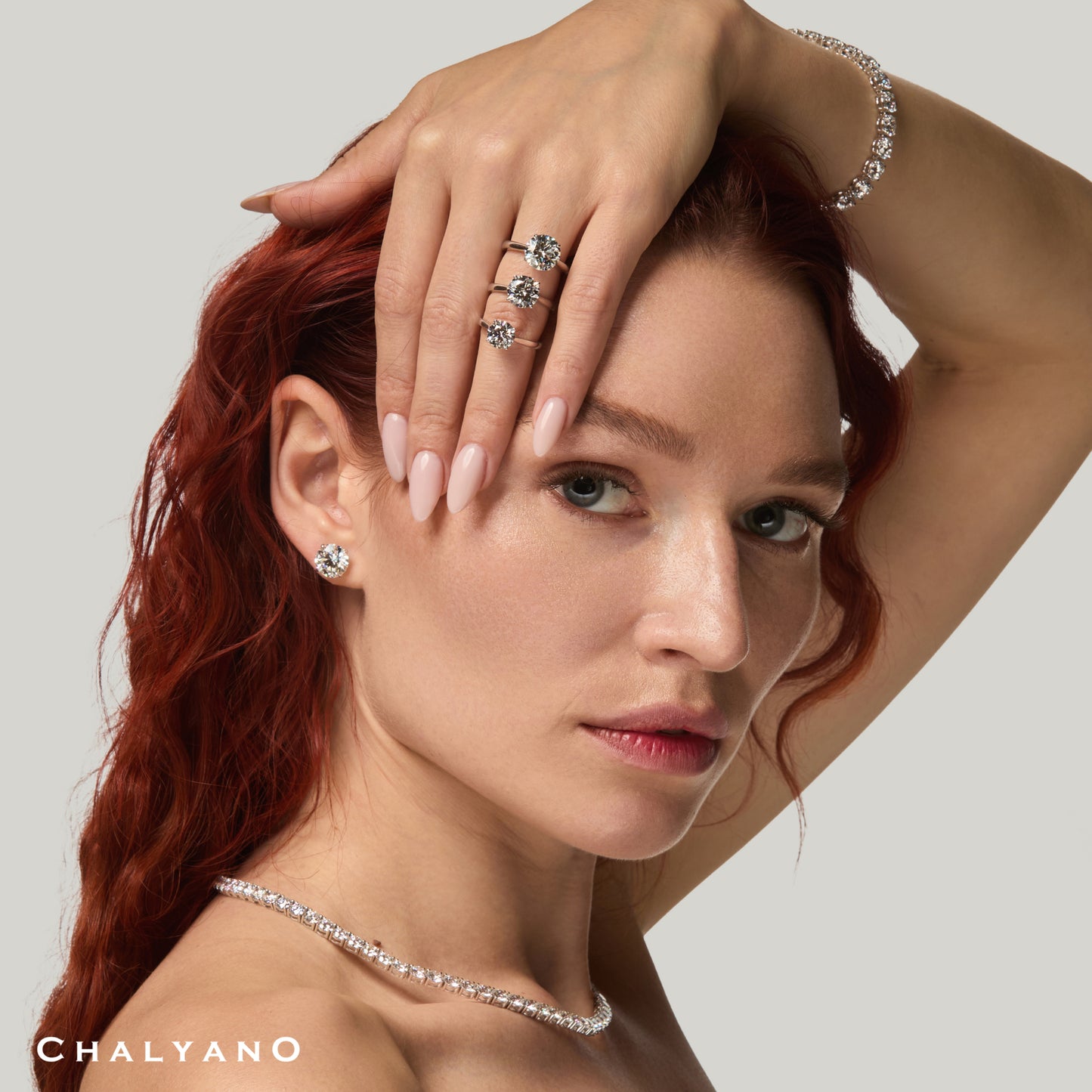 Round Solitaire Engagement Ring side view by Chalyano