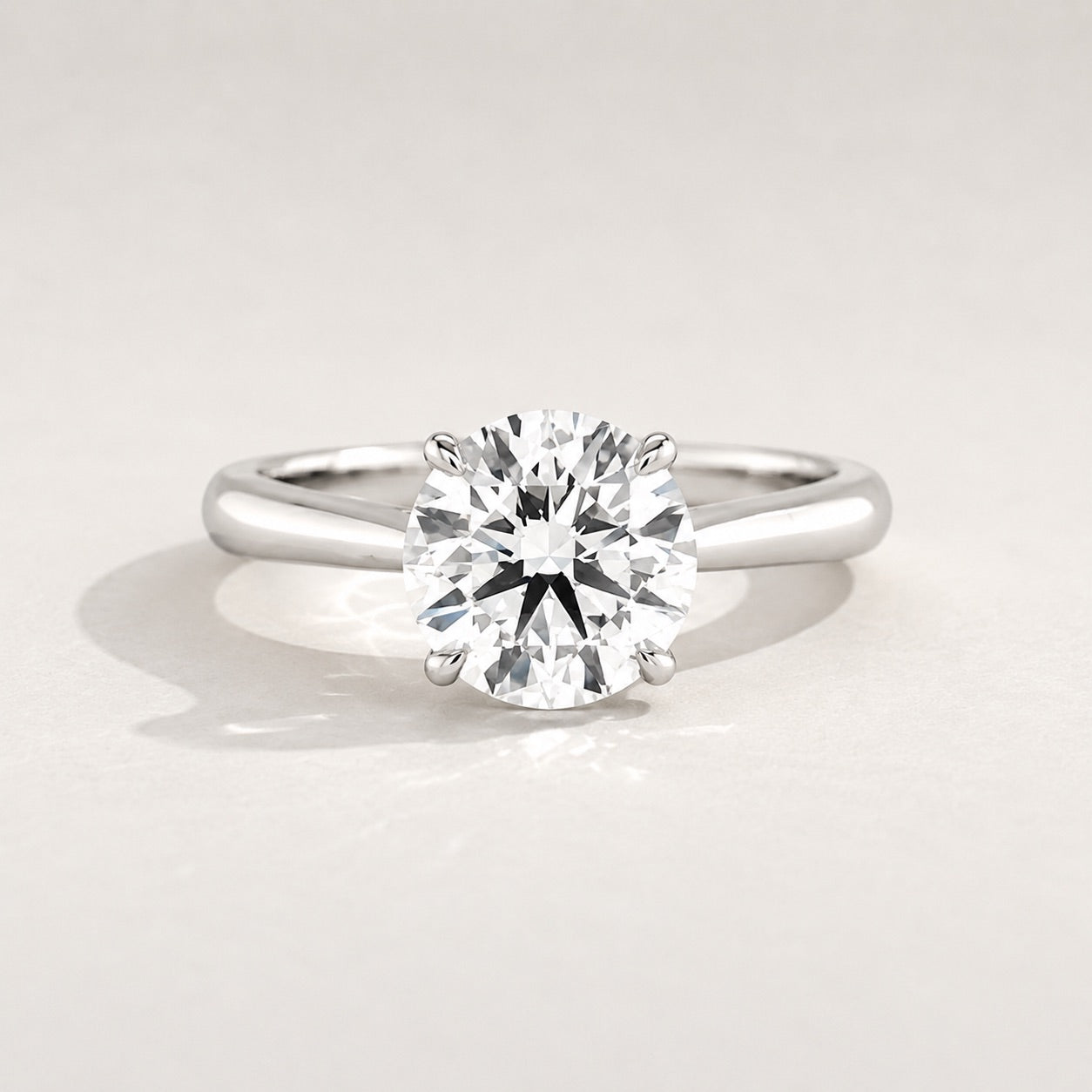 Round Solitaire Engagement Ring by Chalyano
