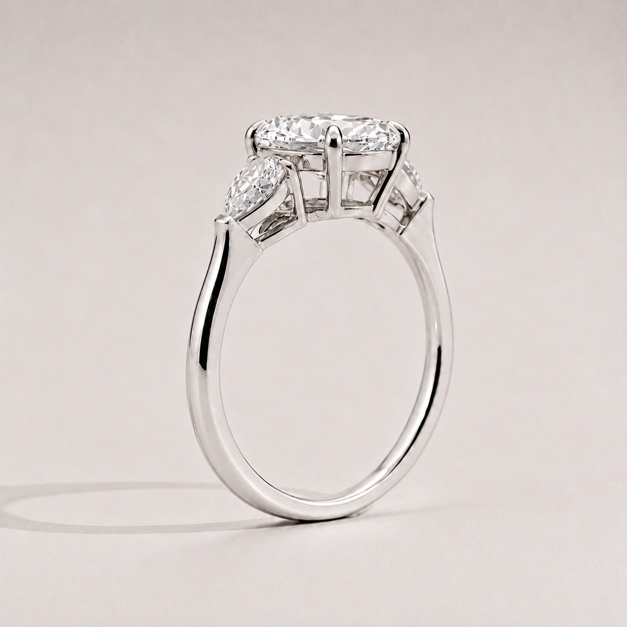 Round Trilogy Three Stone Engagement Ring side view
